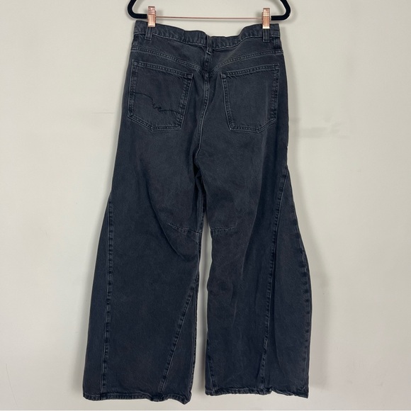 FREE PEOPLE WE THE FREE EDEN HIGH SLOUCHY FLARE JEANS IN BLACK SIZE 28 SHORT - Picture 15 of 16